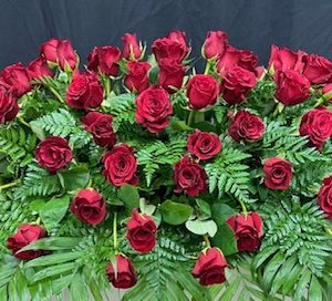 Red rose casket spray